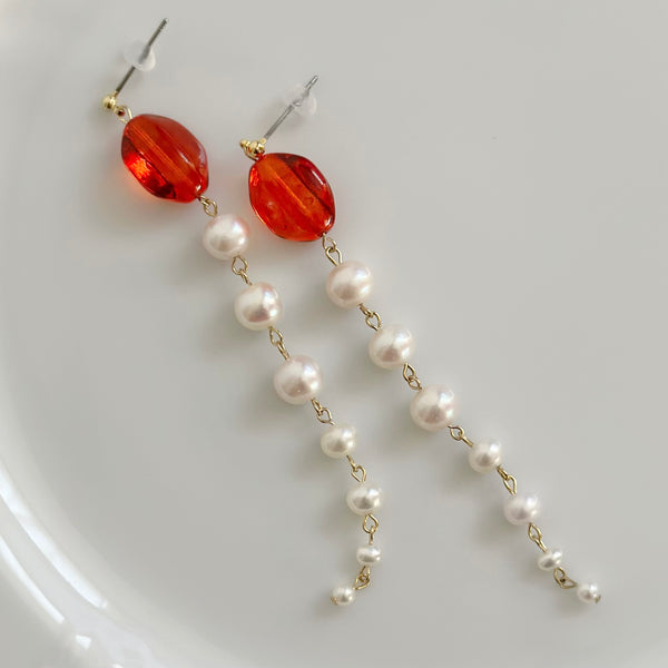 Pearl gradation long earrings, winered orange