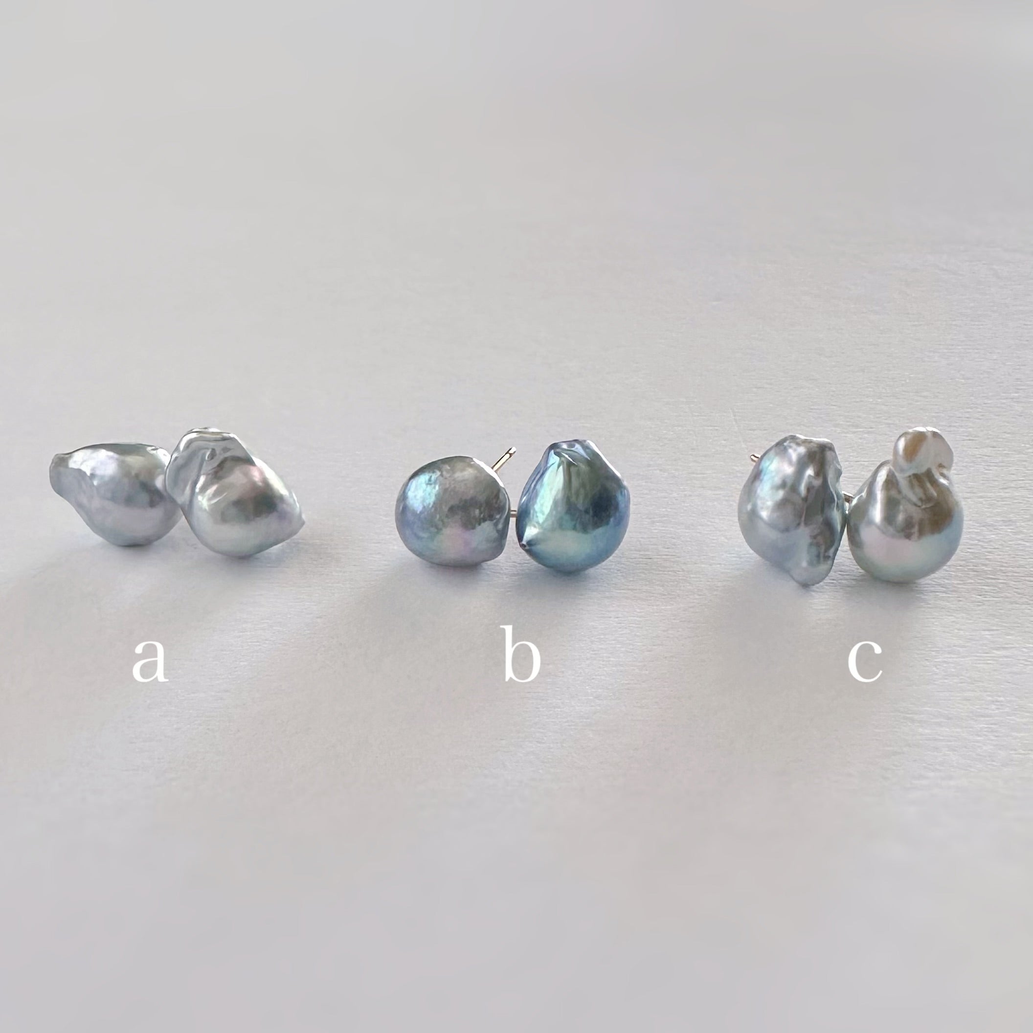 "Veil of Blue ヴェイルオブブルー" ナチュラルブルーアコヤ　一粒　ピアス　k10 一点もの - hikari pearl.